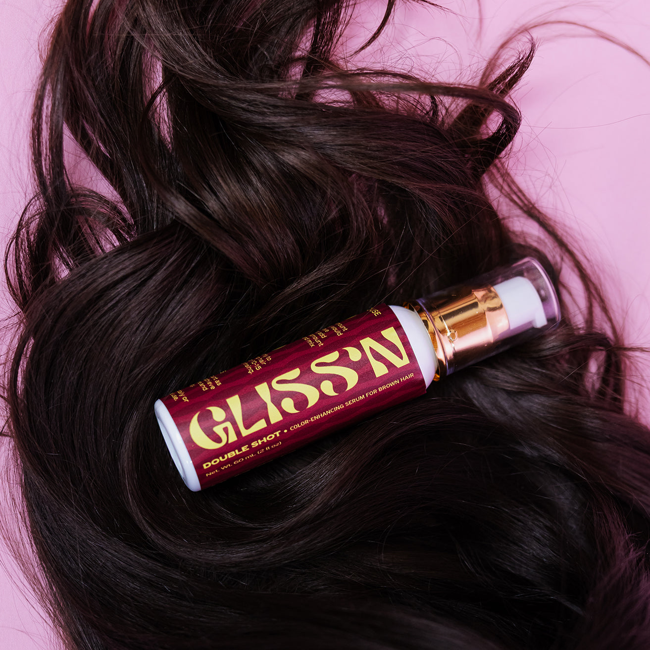 Gliss'n Hair Double Shot hair treatment bottle with pump, creamy formula for nourishing and repairing damaged hair.