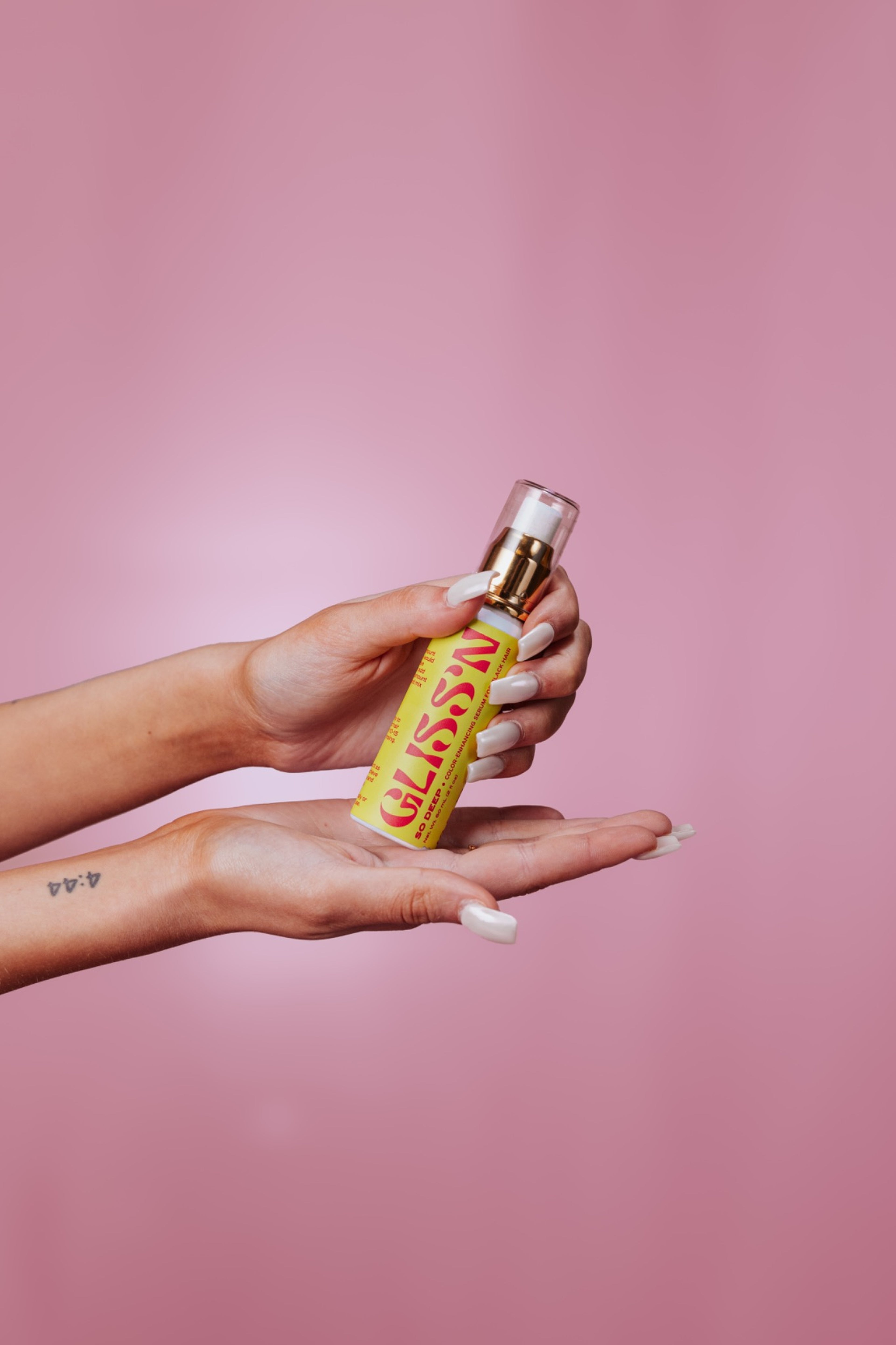 Deep conditioning hair mask by Gliss'n Hair, showcasing rich, creamy texture in a sleek jar for nourishing hair care.